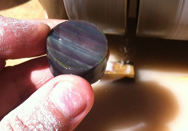 A nice piece of rainbow obsidian ready for shaping and polishing.