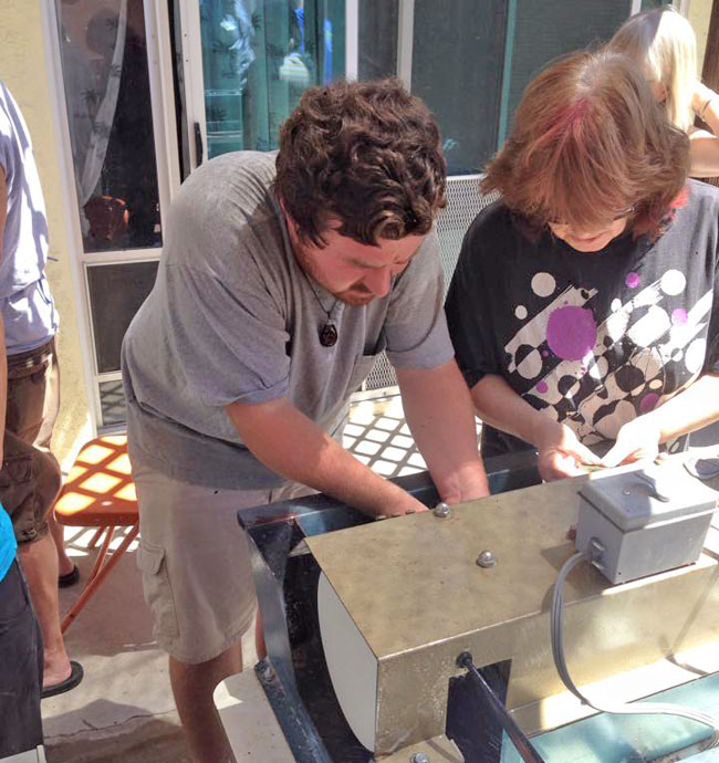 Alex and Sandy White polishing cabs.