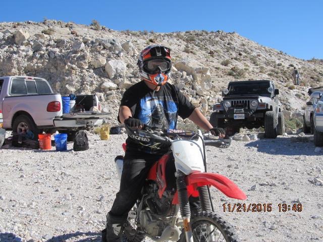 Omid on his bike scouting out other collecting areas.