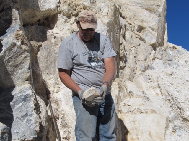 Danny showing of a piece of cave onyx he plucked from the wall.